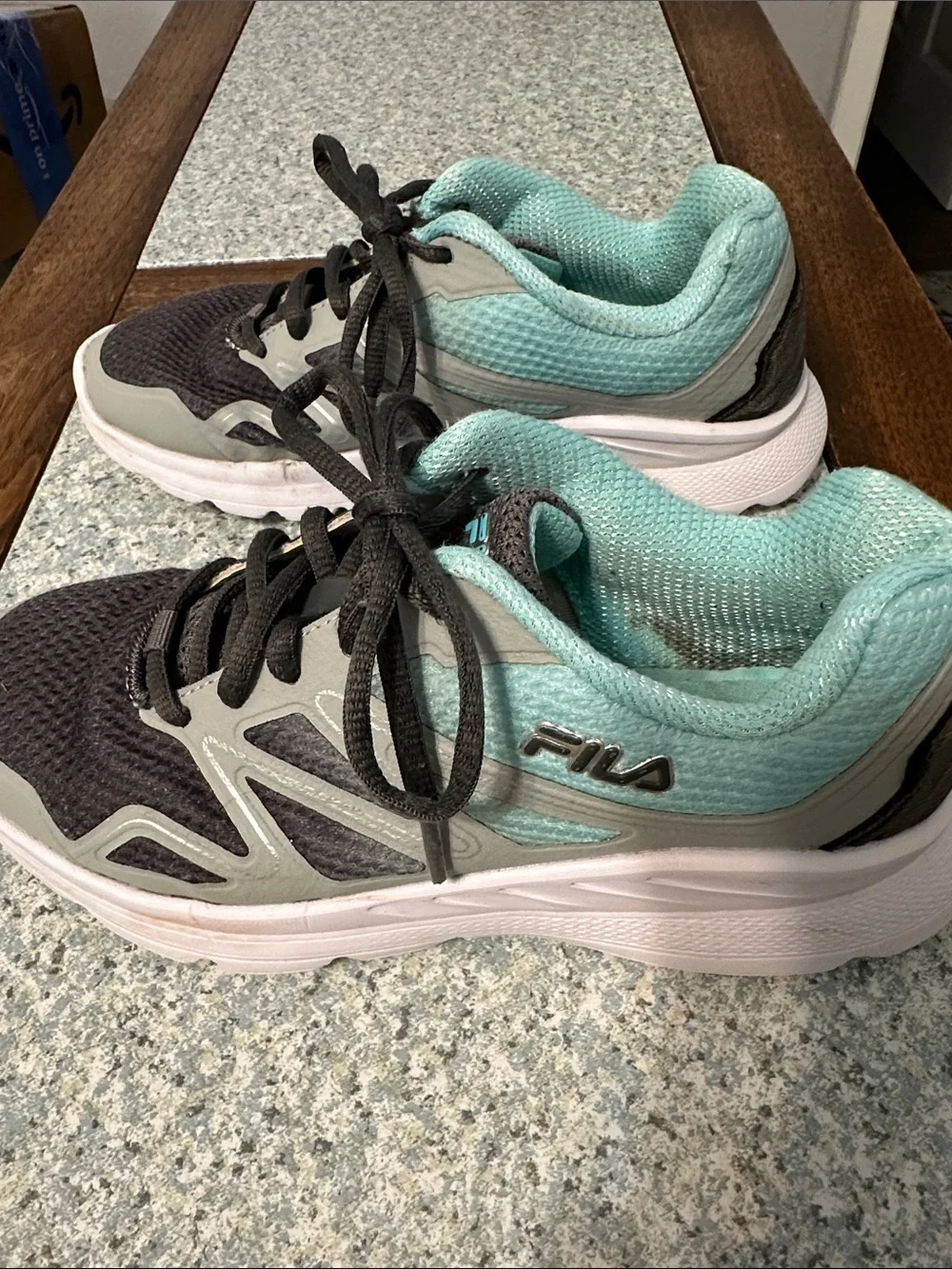 Fila women’s sneakers. Ultra lightweight. Size 6.5. Gray and teal. Breathable